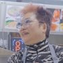 Portrait of A-Xia, owner of Double Lucky Star Hong Kong BBQ in Rockville.
